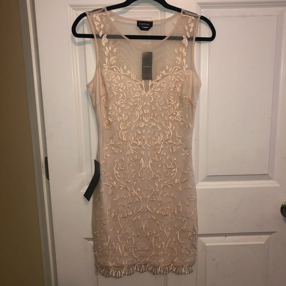 bebe Dresses & Skirts - Cream Bebe dress with beautiful detail
